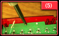 Remove 8 screws that hold keyboard to housing