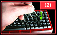 Slide remover down sides of keycap